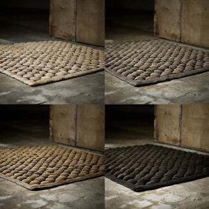 Close-up images of Granito's wool felt rugs in Stone, Light brown, Grey, and Dark brown. Each rug showcases unique textures and colors. Details on wool and acrylic content, along with various sizes.
