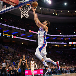 Dario Saric in intense motion, mid-layup attempt, vibrant arena lights creating a dynamic blur around him.