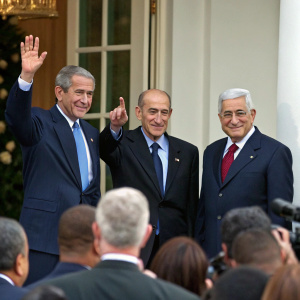 Formal gathering at the White House with George W. Bush, Ehud Olmert, and Mahmoud Abbas in attendance. They are all dressed in suits and waving.