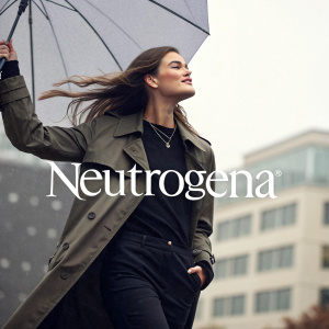 Neutrogena ad featuring a woman with flowing hair holding an umbrella. Brand logo prominently displayed on the image.
