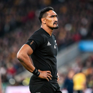 Jerome Kaino, rugby player, intense stare, mustache, wearing black athletic gear, stadium background