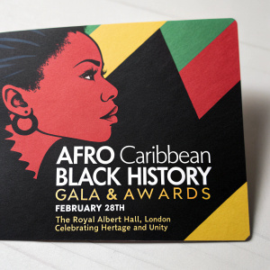 Promotional card for Afro Caribbean Black History Gala & Awards event. Design features bold silhouette of a face with vibrant colors inspired by African flags. Event details: February 28th, The Royal Albert Hall, London. Theme: Celebrating Heritage and Unity. Rich color palette