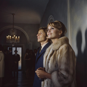 Roman Polanski and Emmanuelle Seigner at the annual Cannes Film Festival after-party. Polanski in a navy blue suit, Seigner in a fur coat.