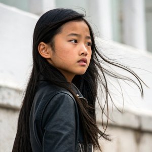 Asian girl, long black hair, serious expression