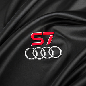 Stylized Audi S7 logo featuring bold red text and white accents on a sleek black background.