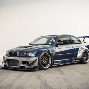 Customized BMW M3 GTR. Evolution from stock model to fully tuned. Dark blue and metallic silver exterior.