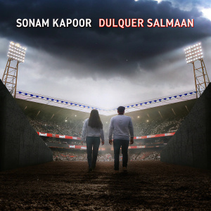 Movie poster featuring Sonam Kapoor and Dulquer Salmaan. Set against a bustling sports stadium backdrop with vibrant lighting. Release date prominently displayed. Energetic and inviting tone.