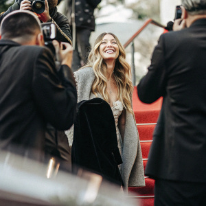 Jessica Biel in a candid photo, stunning smile, long blonde hair, red carpet event