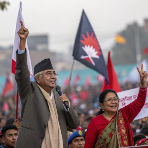 Sher Bahadur Deuba and Arzu Rana Deuba at a political rally. Crowds of supporters waving flags.