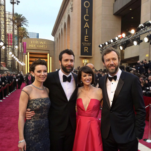 Tatiana Maslany, Tom Cullen, Dawn O'Porter, and Chris O'Dowd attending a glamorous Hollywood award ceremony.