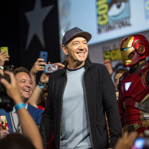 Kevin Spacey at Comic-Con, in a casual outfit. Surrounded by enthusiastic fans and cosplayers.