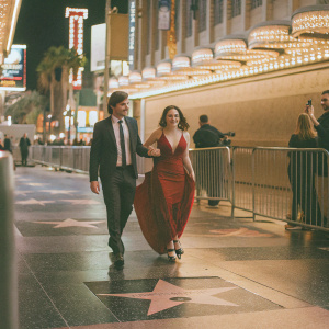 Jason Ralph and Rachel Brosnahan walking down the glamorous Hollywood Walk of Fame.