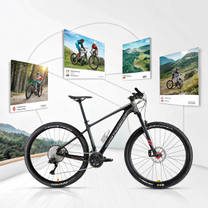 Digital showcase for Tropix Bike Malaysia featuring a sleek mountain bike ad and engaging cycling content on a clean, minimalist background.