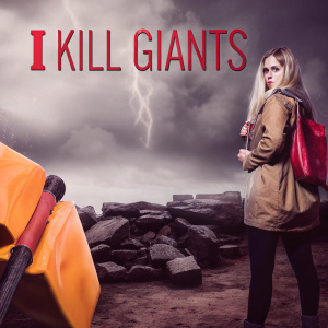 Poster for 'I Kill Giants'. Young blonde protagonist standing on rugged terrain. Facing a towering monster. Dark, stormy backdrop.