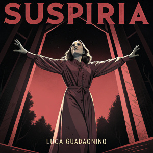 Poster for 'Suspiria'. A woman in dramatic pose, arms wide, against dark background with red accents. Title 'Suspiria' in bold font. Director: Luca Guadagnino.
