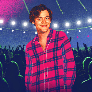 Harry Styles, with a casual smile, in a plaid shirt. At a crowded concert venue.