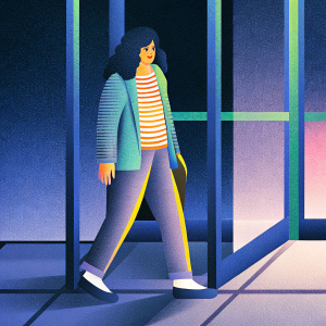 Camille Strauss-Kahn, daughter of Dominique Strauss-Kahn, walks out of a modern office building. She has a youthful appearance with dark wavy hair and is wearing a striped shirt and blazer. The scene is captured in a candid shot with a dark background and subdued lighting.