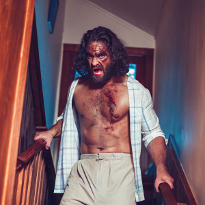 A towering figure, known as Goliath, emerges from the shadows. With muscles that seem to burst from his torn flesh, his menacing expression and tangled mop-like hair convey an aura of relentless brutality. His shredded torso and battered skin narrate a saga of unrelenting ferocity.