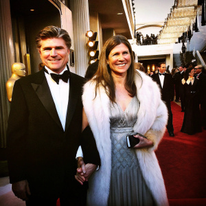 Treat Williams and Pam Van Sant at a glitzy Hollywood gala. Both dressed in evening wear, posing with a smile for the camera.