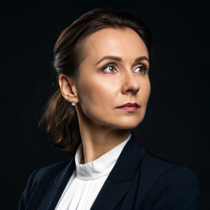 Website profile of Ekaterina Sidorova, professional lawyer. Dark background, headshot, serious expression