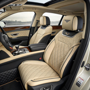 High-end SUV, Bentley Bentayga W12, luxurious interior. Beige and black seats with intricate stitching. Sleek design