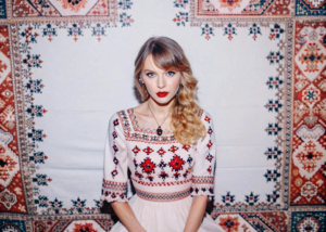 illustration of Taylor swift, set in a Slavic-inspired environment. Surround the designer with motifs and decor typical of Slavic culture. 