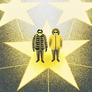 Elle-Maija Tailfeathers and co-star posing confidently on the Hollywood Walk of Fame. Padded jackets, sunglasses