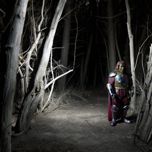 3D model of King Ganondorf. He stands menacingly in a desolate, moonlit forest. His deep green face contrasts against the stark, shadowy backdrop.