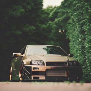Digital art of a sleek R34 Nissan GTR, heavily modified with exposed engine components and aggressive styling. The car is set against a minimalist backdrop in high detail 3D rendering.