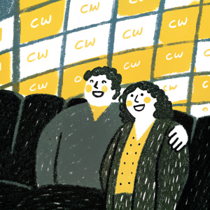 Raini Rodriguez and Rico Rodriguez, siblings, at a CW network event. They pose with joyous smiles in front of a vibrant CW logo wall.