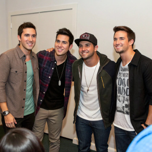 Kendall Schmidt, Logan Henderson, Carlos Pena, and James Maslow of the Jonas Brothers at a casual meet and greet. No backdrop