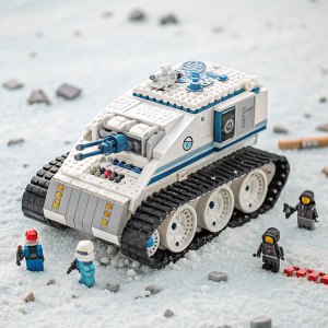 A detailed shot of the LEGO Ninjago Movie Ice Tank, white with blue and grey accents. The tank is shattered, pieces scattered. Kids in ninja costumes are joyfully gathered around it.