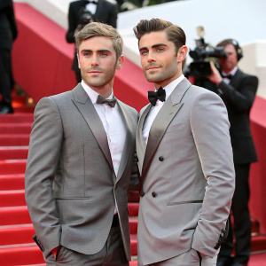 John 'Chickie' Donohue and Zac Efron in matching gray suits at Cannes Film Festival red carpet.