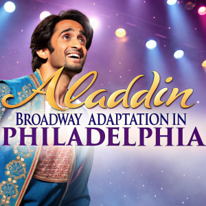 Promotional poster for 'Aladdin' Broadway adaptation in Philadelphia. Colorful stage lights in background.
