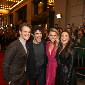 Jonathan Groff, Darren Criss, Julianne Hough, and Lea Michele attending the opening night of a Broadway show. Crowd cheering in the background.
