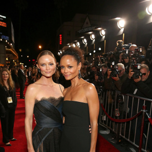 Stella McCartney and Thandie Newton at a Hollywood film premiere. Crowded and glamorous red carpet setting.
