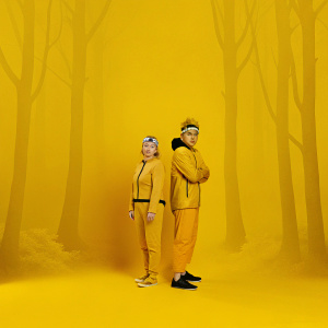Sakura Haruno and Naruto Uzumaki standing in front of a stylized forest backdrop. Sakura has a serene expression, while Naruto wears his iconic outfit with the village hidden in the leaves headband. Greenish hue, stylized tree trunks