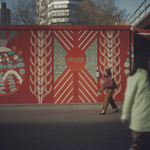 Oplates mural, a colorful street art piece featuring a unique Korean-inspired design in the heart of the city.