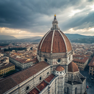 Aerial view of the Florence Cathedral. Dome and spire reaching towards the clouds.