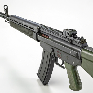 A detailed image of a Heckler & Koch G3 rifle. Dark grey finish, green handle. Professional military grade equipment. Clean, studio setting