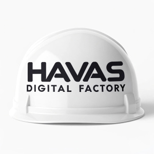 A sleek, modern logo for Havas Digital Factory. Utilizing a minimalist design approach, it features 'Havas Digital Factory' in bold, clean sans-serif font. The color scheme is monochromatic, with crisp black text on a white background, emphasizing simplicity and professionalism.