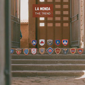 Homepage section featuring 'La Monda / THE TREND'. Dynamic grid showcasing the evolution of soccer team emblems over decades.