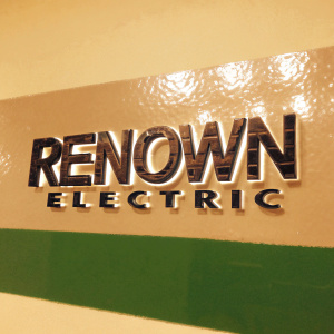 Logo for Renown Electric, sleek and modern design. Shiny metallic font against a matte, dark background. Contrasting texture and colors