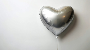 heart shape helium foil balloon isolated on white background