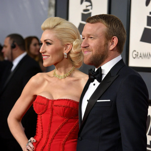 Gwen Stefani and Guy Ritchie attending the annual Grammy Awards ceremony. Both dressed in formal attire.