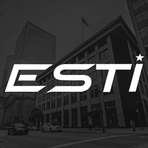 Modern logo design of the word 'ESTI' in bold white letters on a sleek black background.