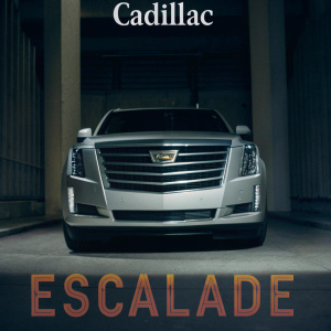 Luxury car ad for Cadillac Escalade featuring sleek modern design with bold text overlay.