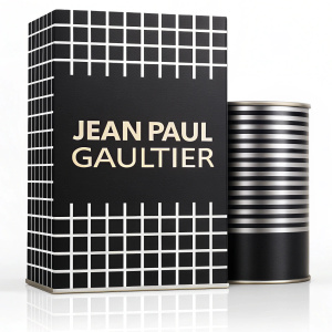 Jean Paul Gaultier product packaging, sleek design with bold text. The background is a black grid pattern.