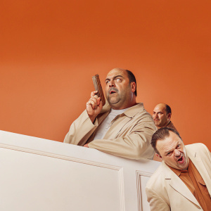 A&E HD advertisement featuring characters from The Sopranos. Dark background, montage style, highlighting new era of entertainment.