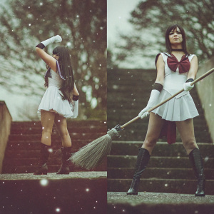 Sailor Moon in dual poses. One fighting pose with broom, other casual standing. Both set against starry night sky.